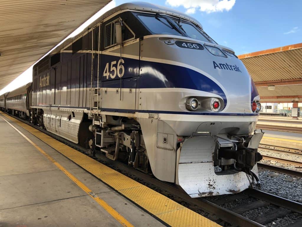 An Amtrak train sits at the station, ready for passengers
