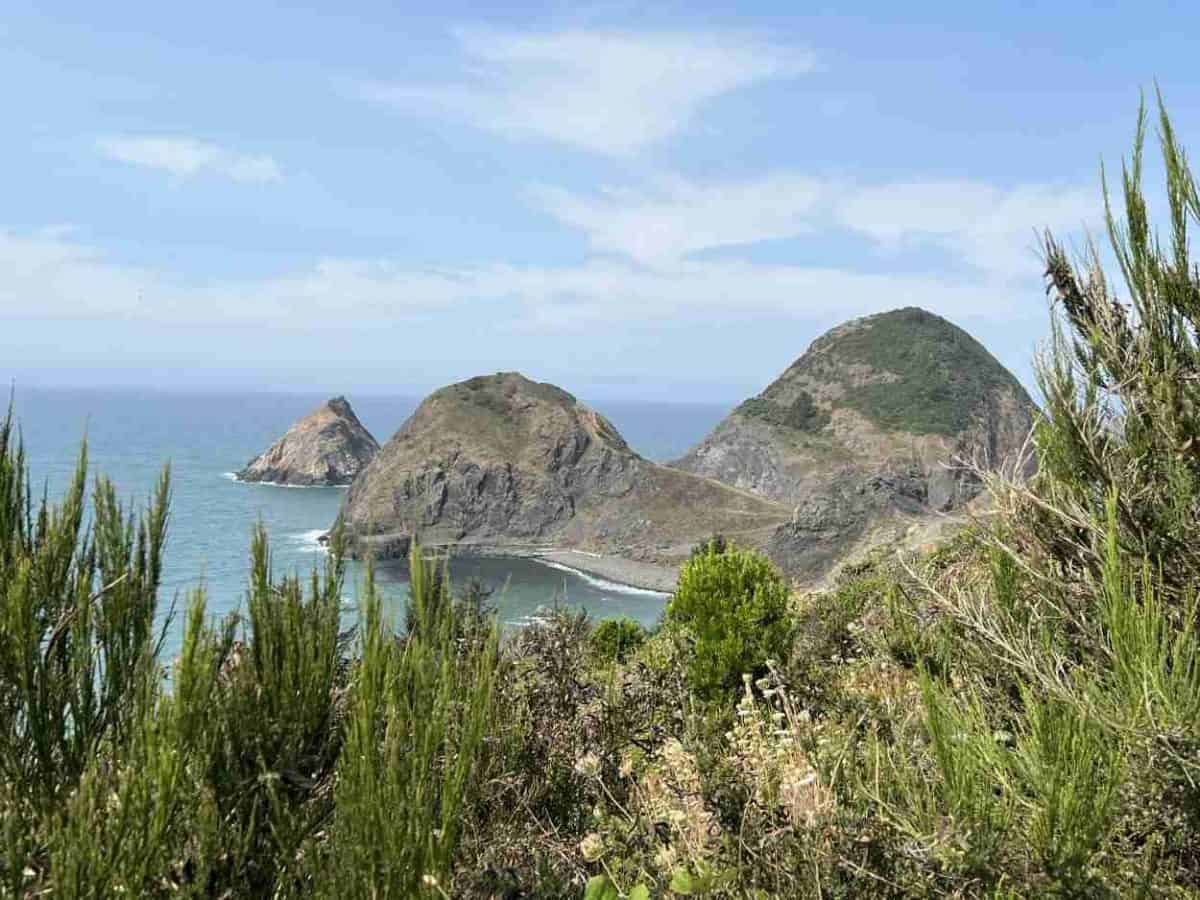 Sisters Rock in Port Orford, Oregon, has secluded beaches and a sea cave.