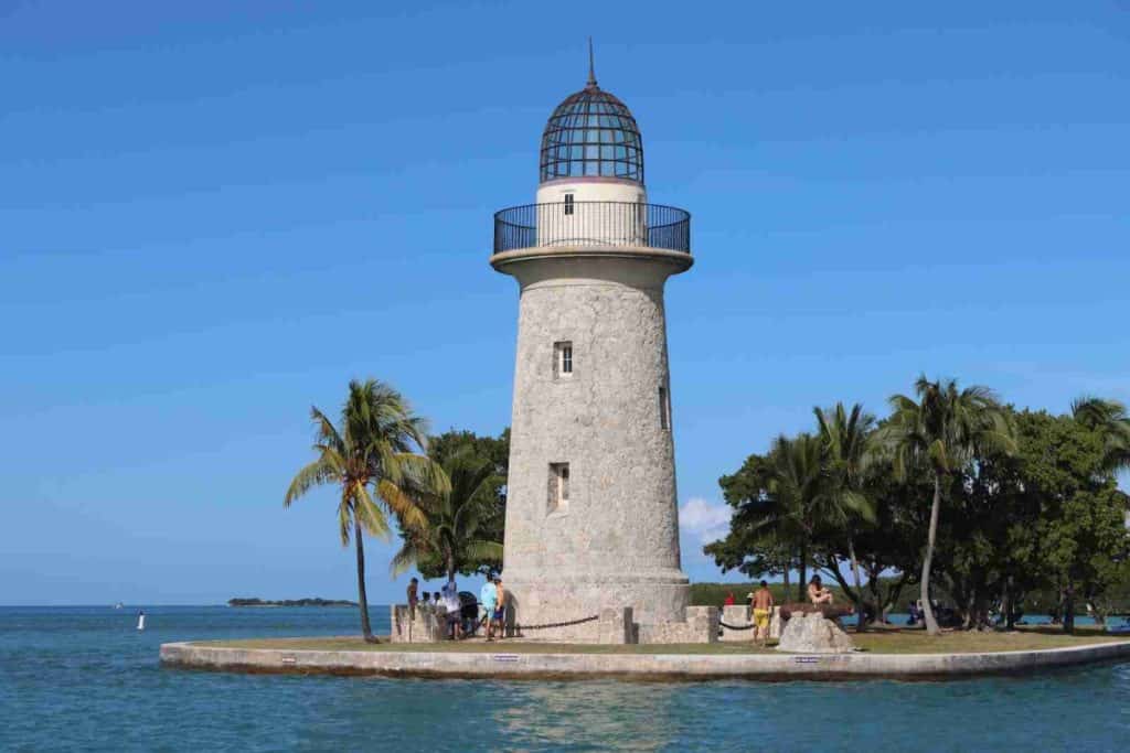 a light house sitting on top of a small island - Biscayne National Park