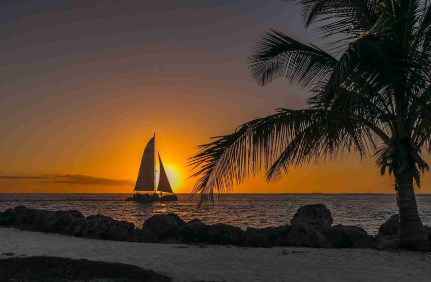 sailboat at sea near seashore
