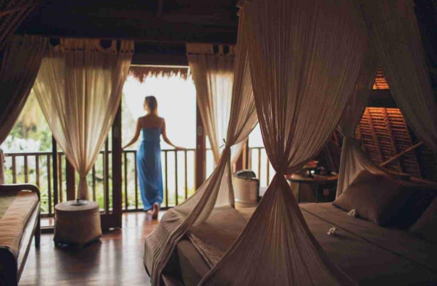 Woman Leaning on Handrail in Room