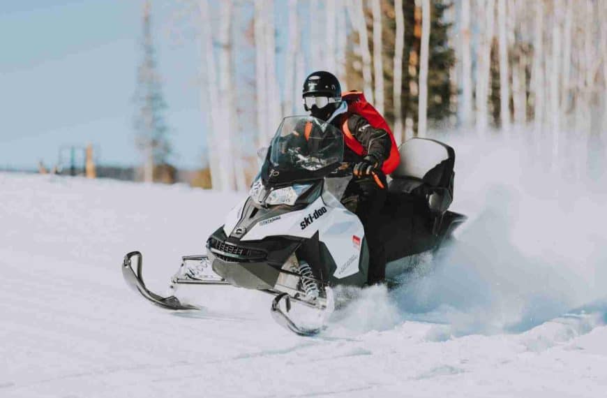 unique winter adventures in national parks - snowmobiling in Yellowstone National Park