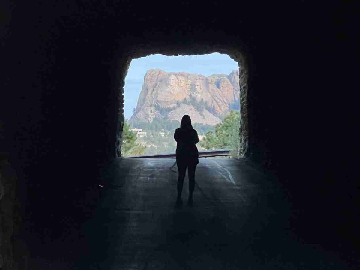 View of Mt Rushmore through a tunnel on Iron Mountain Road