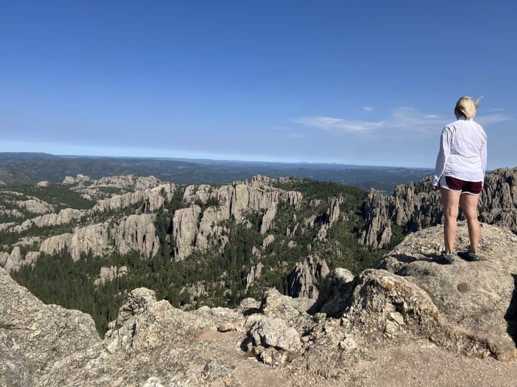 Standing at peak of Little Devils Tower