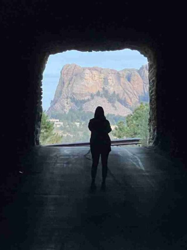 View of Mt Rushmore through a tunnel on Iron Mountain Road
