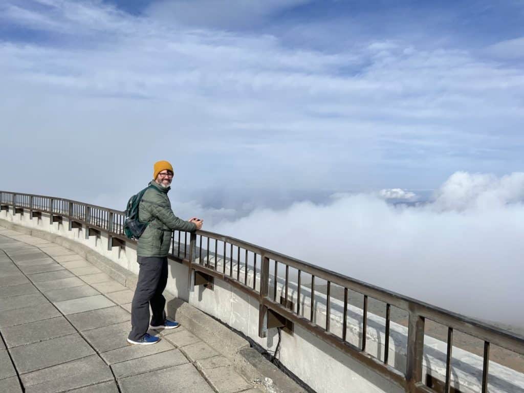 Preparing for more clouds to blow through on the Mount Washington observation deck