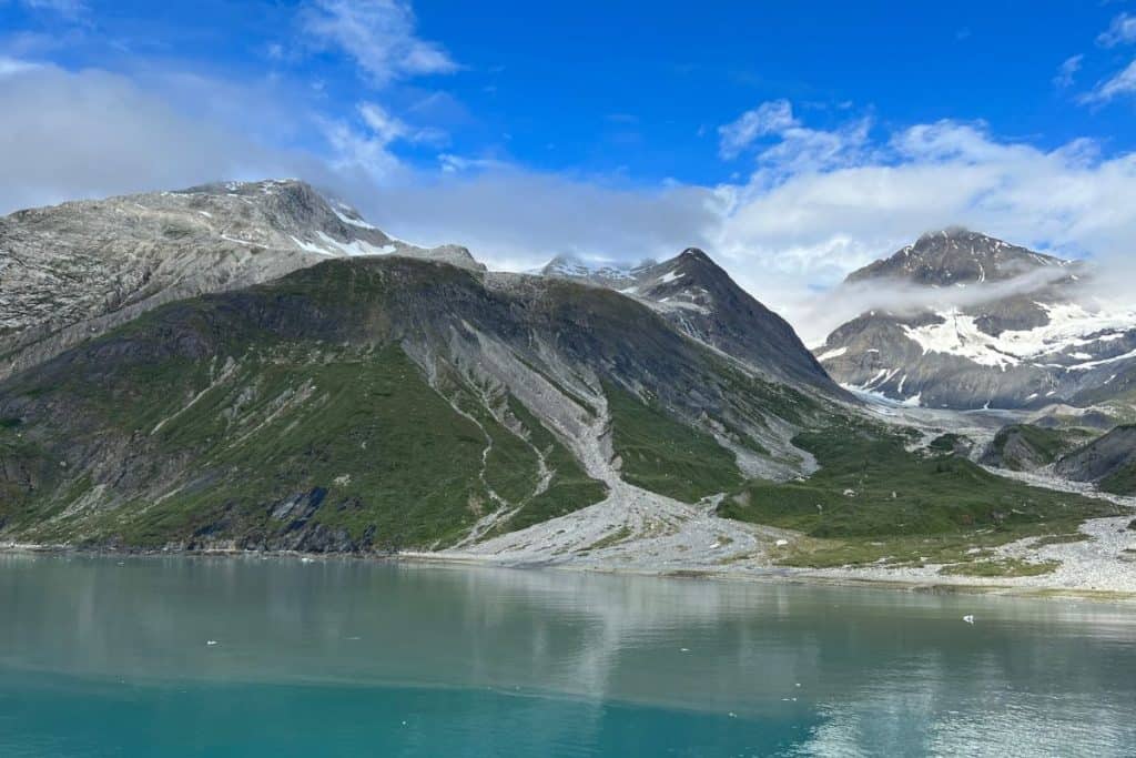 Turquoise waters, mountains, and blue skies in Glacier Bay