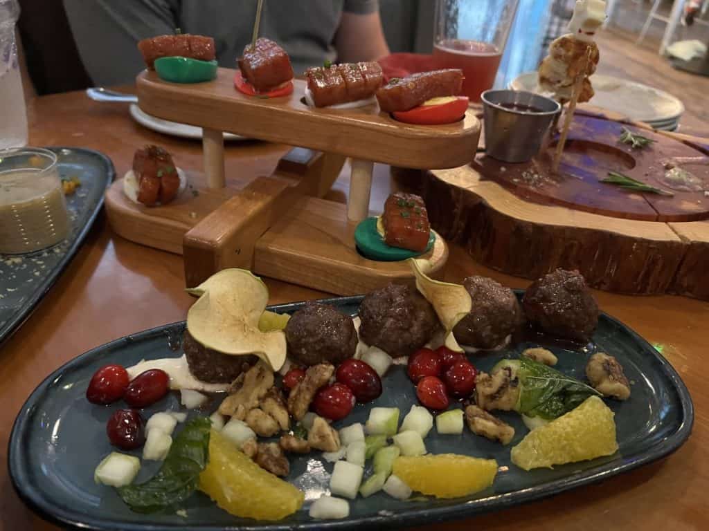 Disney Springs Hangar Bar menu at Christmas - cranberry barbecue meatballs