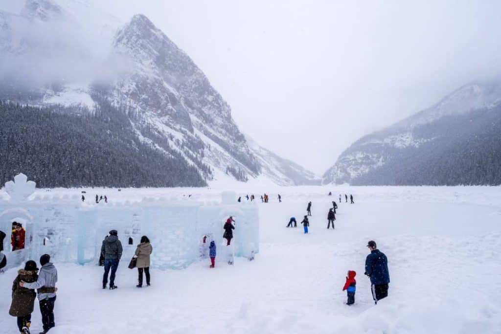 Guests play in the snow at SnowDays Festival in Lake Louise in Banff National Park