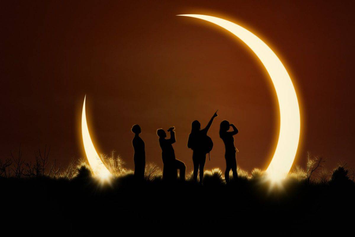 People looking at a solar eclipse