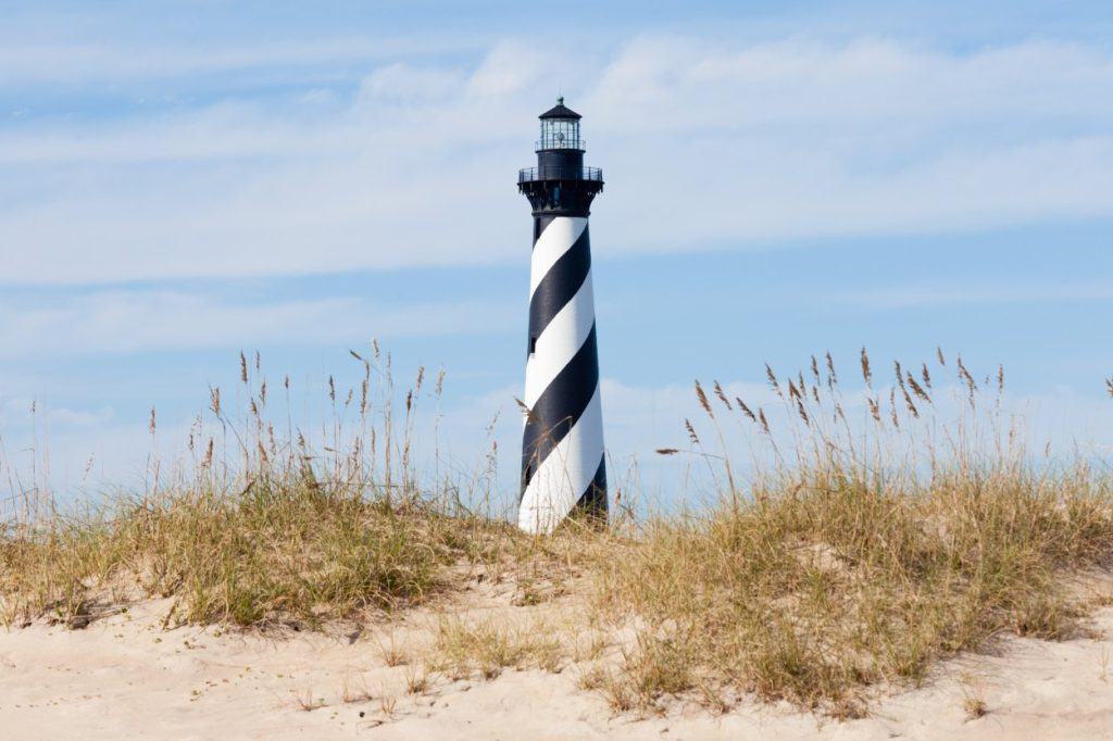 Cape Hatteras Lighthouse stands high above the Outer Banks dunes