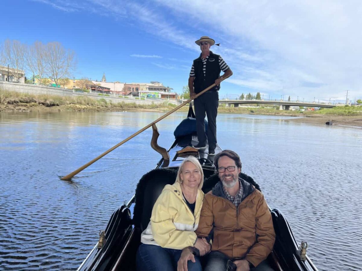 Scott McConkey and Julie McConkey of Miles with McConkey Travel Blog take a gondola ride in Downtown Napa