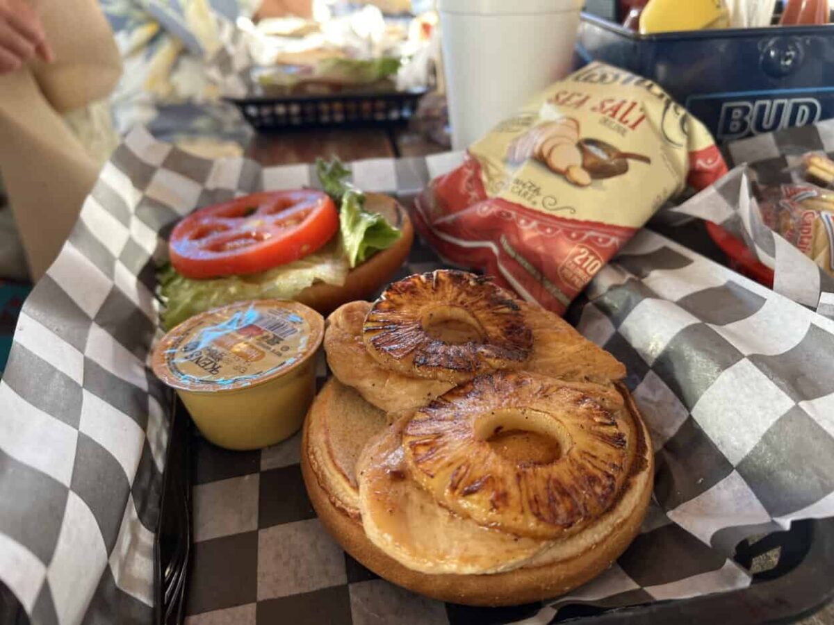 A Hawaiian chicken sandwich and a bag of chips at Paddy's Raw Bar in St. George Island.