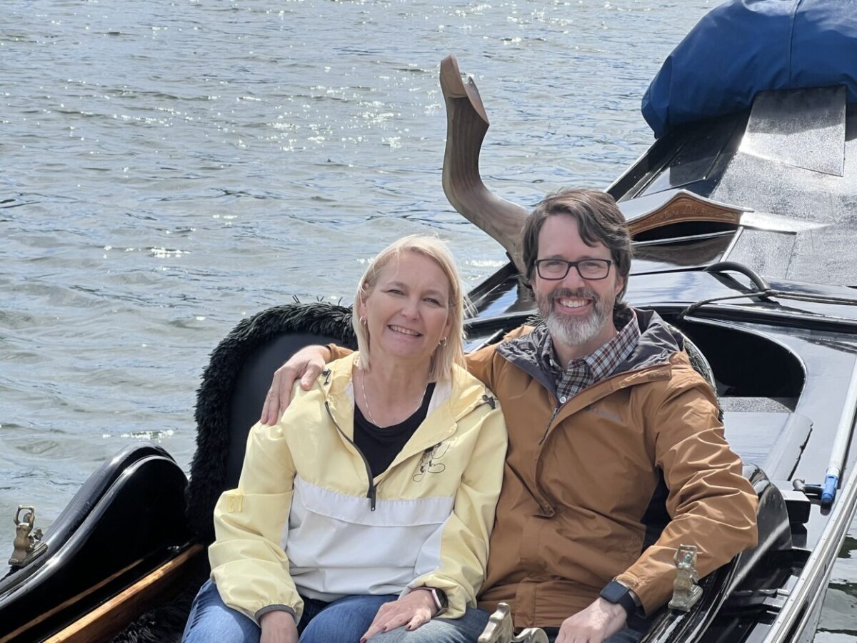 Scott McConkey and Julie McConkey of the Miles with McConkey Travel Blog enjoy a gondola ride in Napa Valley, CA.