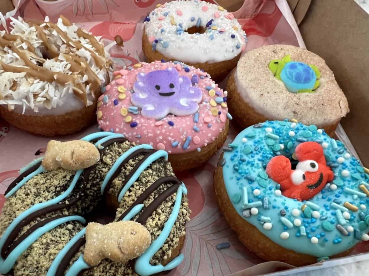 Beautifully decorated donuts in a box