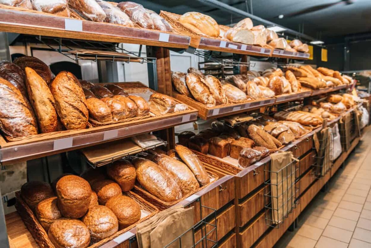 Shelves of bread in a grocery store