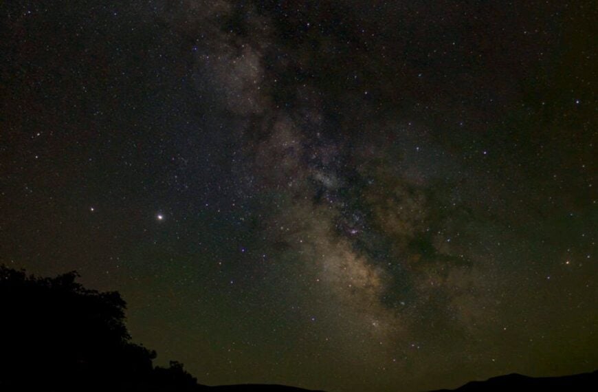The Milky Way brightens the night sky in Bruneau Dunes State Park, ID