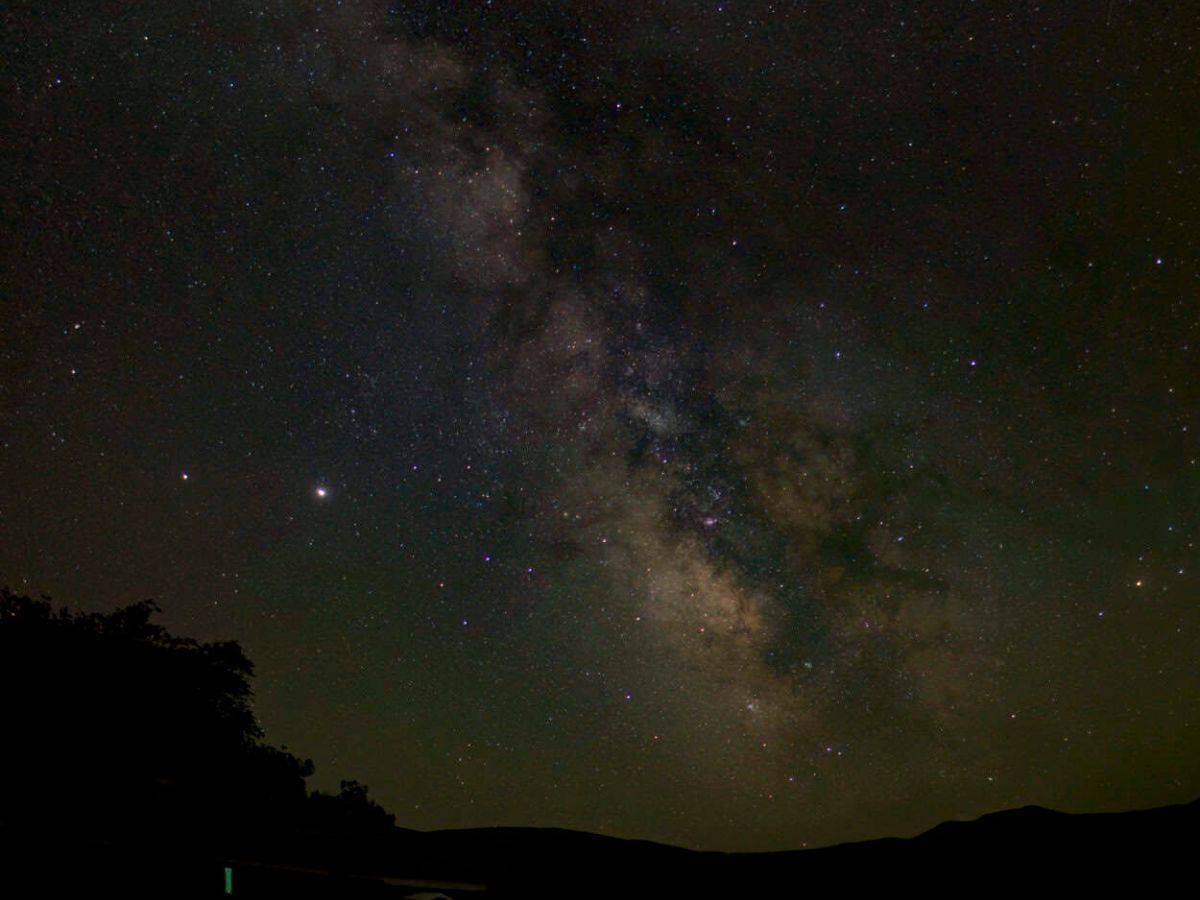 The Milky Way brightens the night sky in Bruneau Dunes State Park, ID