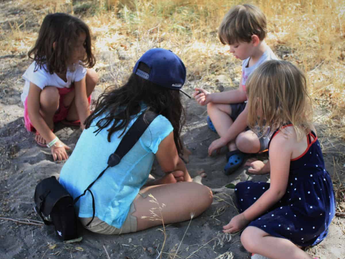 Children play in the sand