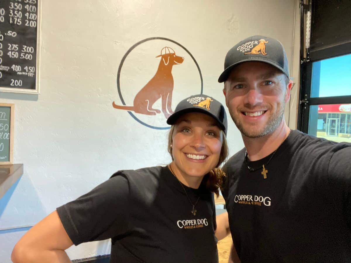 Copper Dog Cafe co-owners, Brittany and Mike Kennedy, pose for a picture.
