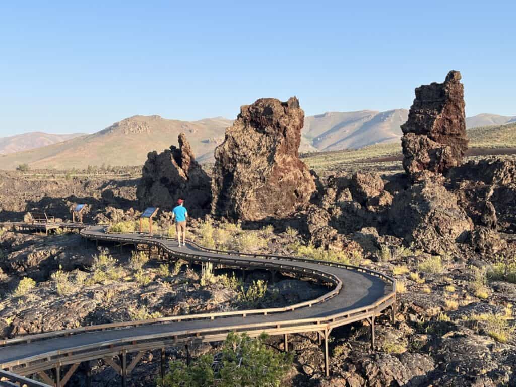 Scott McConkey, travel writer and founder of the Miles with McConkey Travel Blog, hikes a trail at Craters of the Moon National Monument, Arco, Idaho.