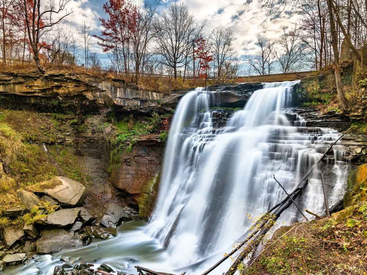 Water spills over a rocky ledge in Cuyahoga Valley Falls National Park, Ohio.