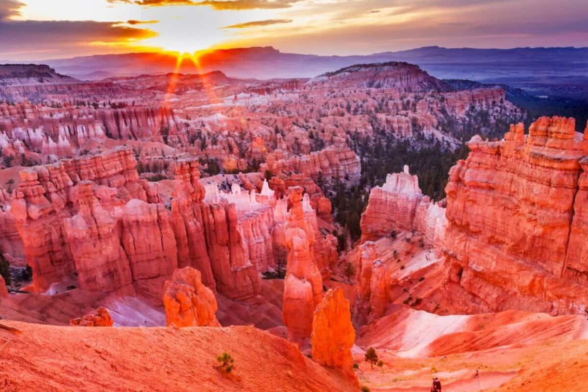 The sun rises over Bryce Canyon.