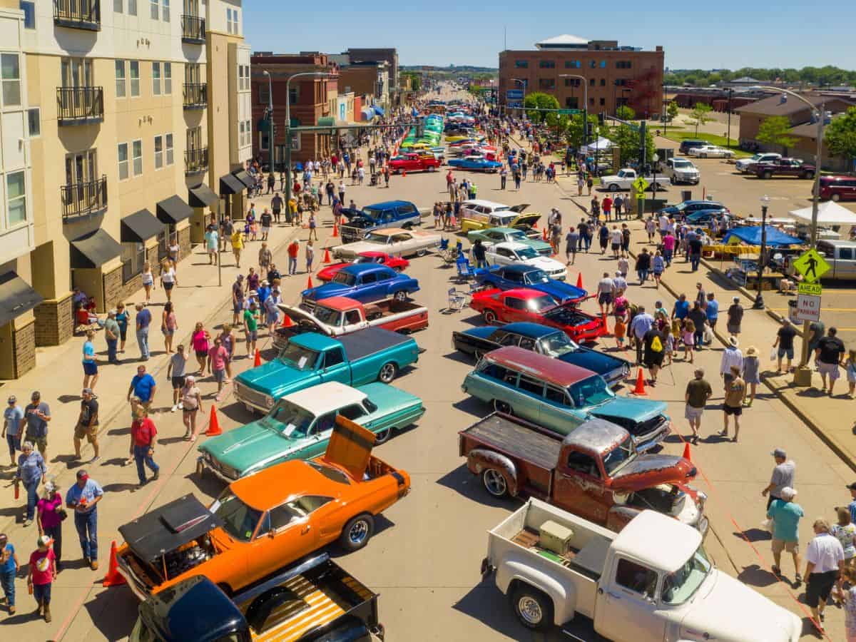 Vintage cars line a street in Mandan, North Dakota.