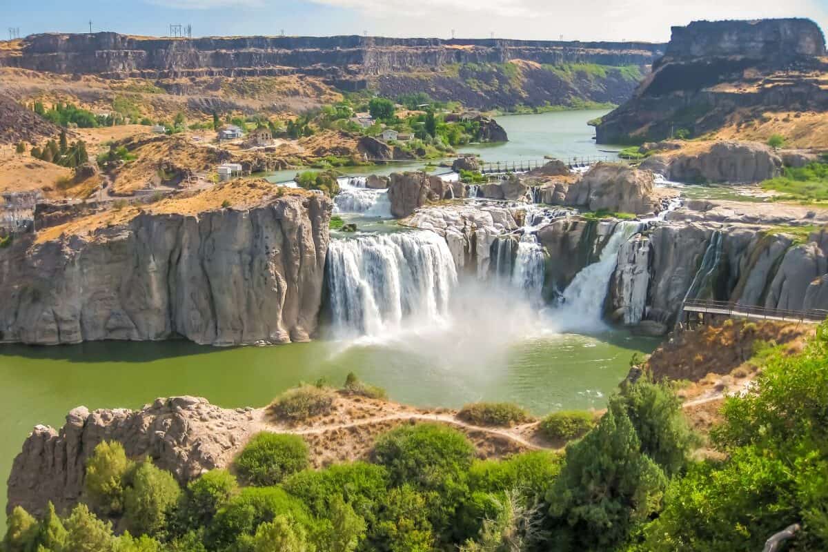 A powerful waterfall pours over a cliff along the Snake River in Twin Falls, Idaho.