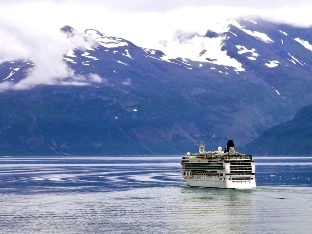 A cruise ship sails through Glacier Bay in Alaska