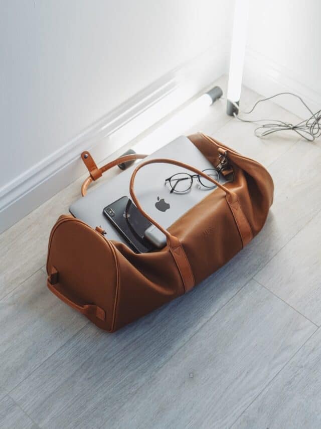 travel items on duffel bag