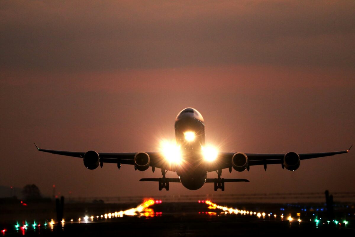 A plane comes in for a landing on the runway.