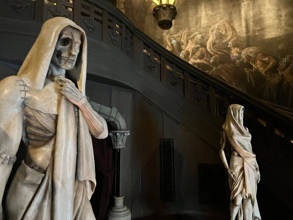 Creepy statues in Frankenstein Manor at the monsters themed land in Epic Universe
