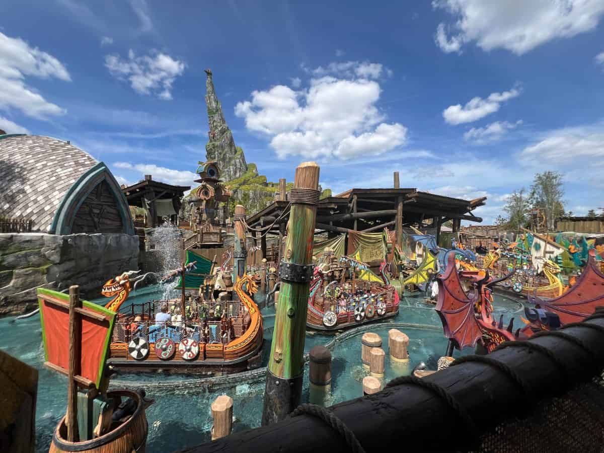Guests shoot water from cannons on a Viking ship on a ride in Epic Universe's Isle of Berk.