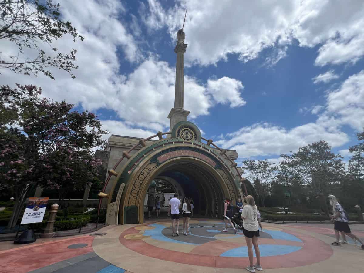 Guests walk through the Ministry of Magic portal in Epic Universe, Orlando, FL.