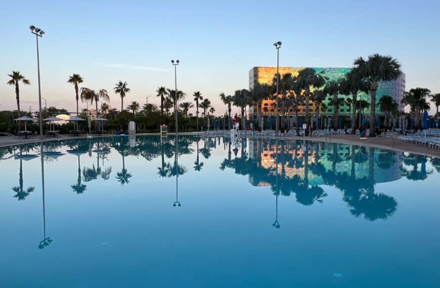 Reflections of palm trees show in the Stella Nova Resort pool