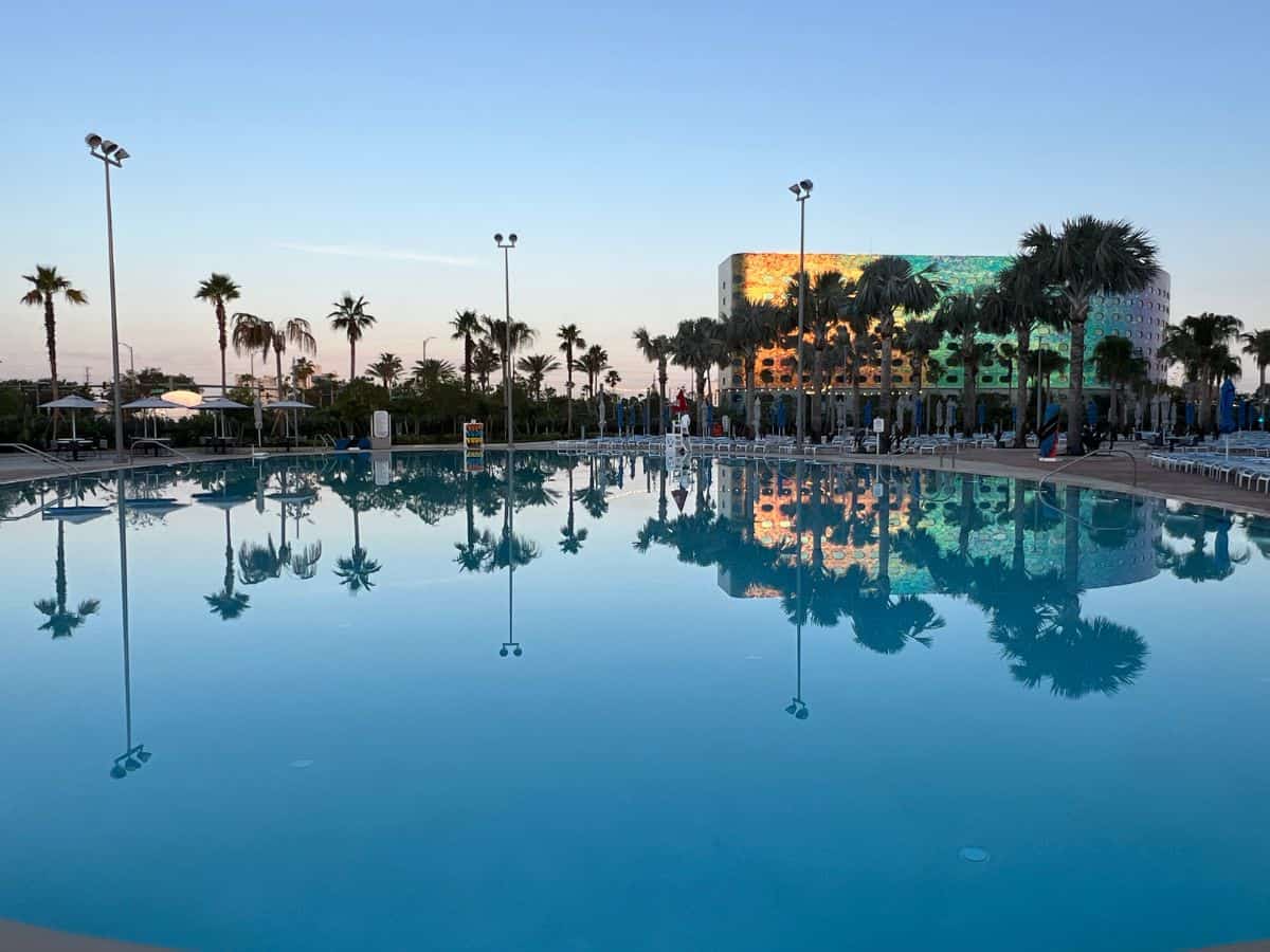 Reflections of palm trees show in the Stella Nova Resort pool