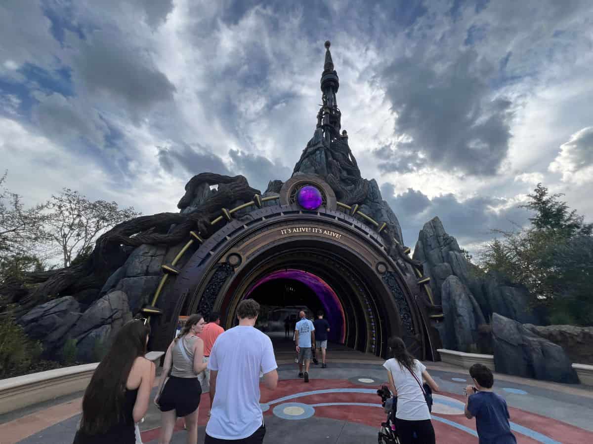Visitors walk toward the Dark Universe portal in Epic Universe