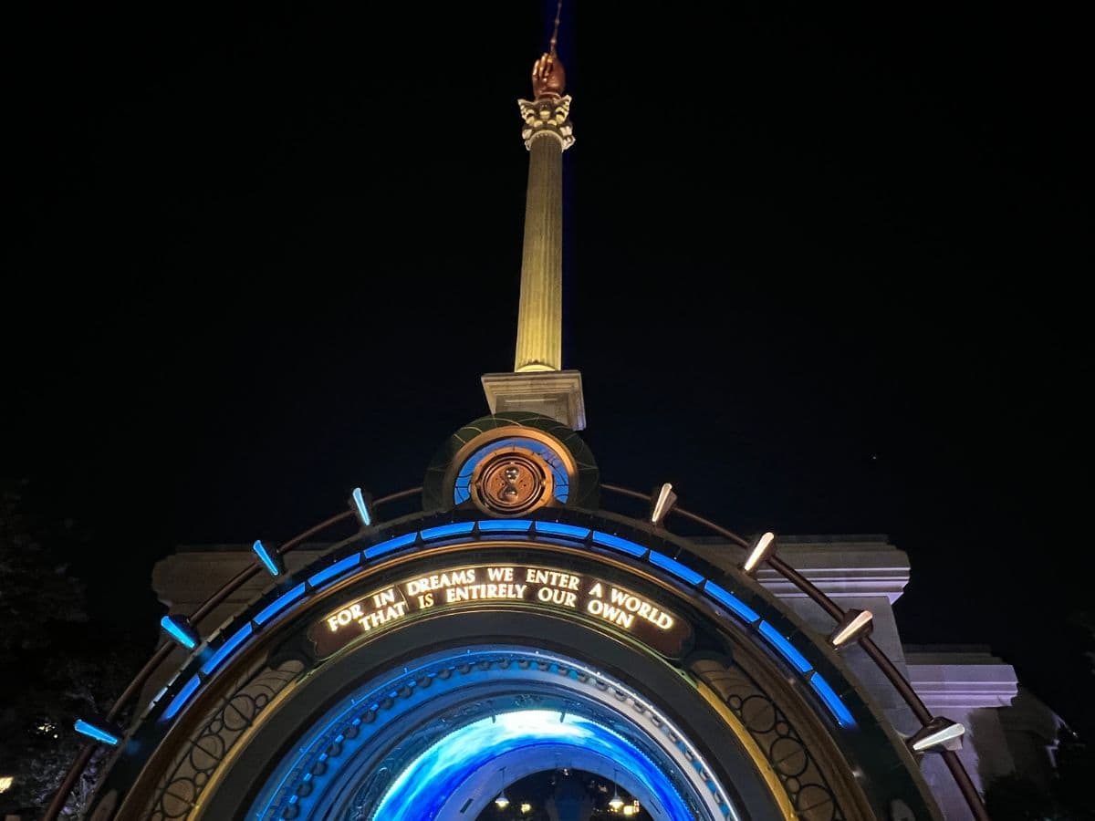 An inscription, "For in dreams we enter a world that is entirely our own." displays on the Ministry of Magic portal.