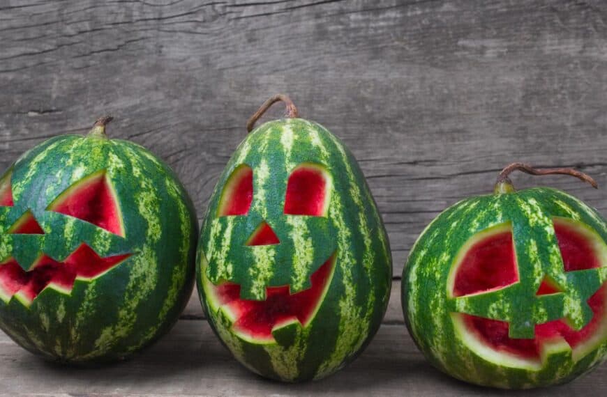 Carved watermelons or jack-o-melons are a tradition for celebrating Summerween - Halloween in summer
