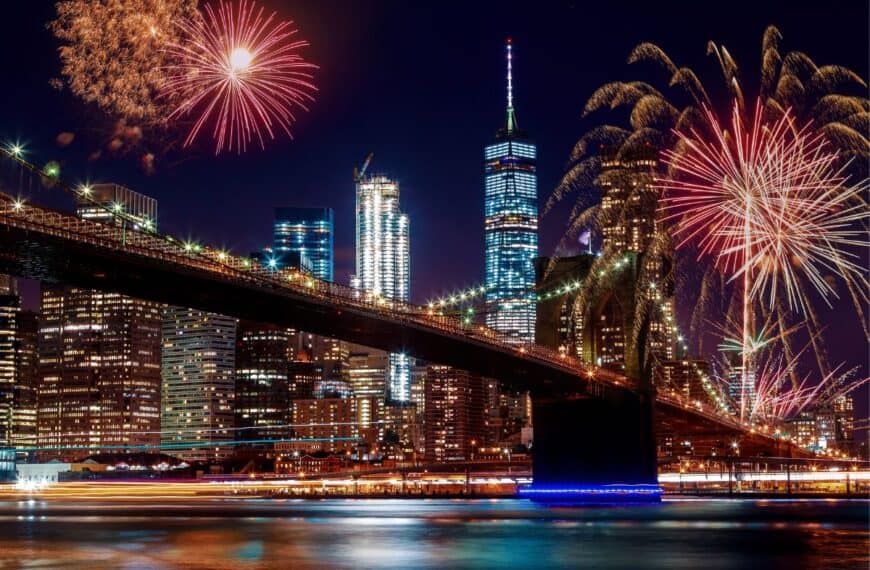Fireworks light up the sky above the Brooklyn Bridge in NYC, one of the best U.S. cities for 4th of July