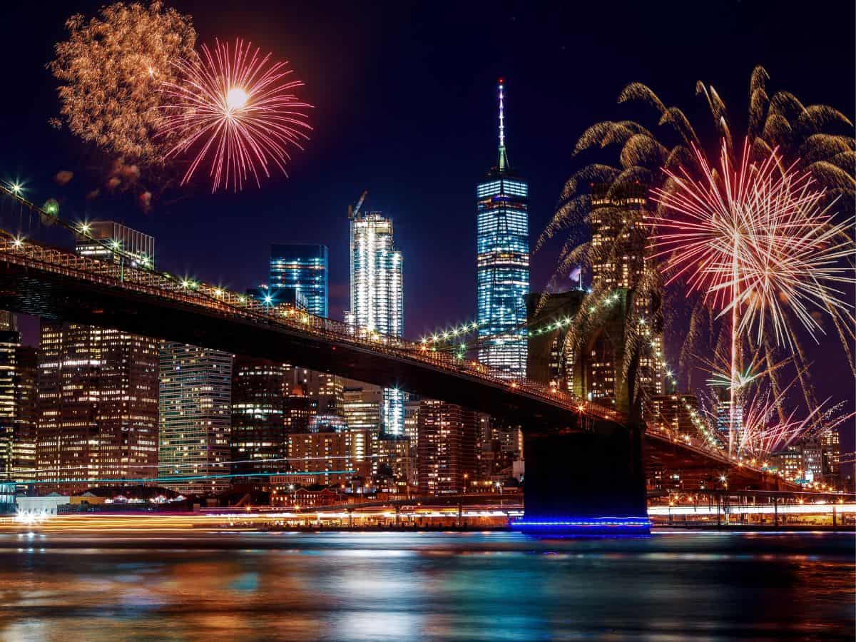 Fireworks light up the sky above the Brooklyn Bridge in NYC, one of the best U.S. cities for 4th of July