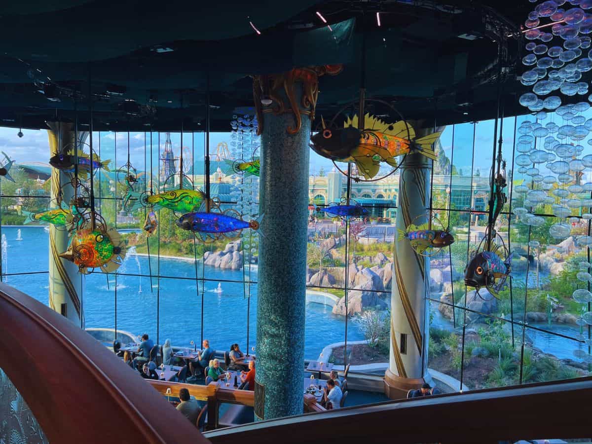 Colorful fish hang from the ceiling in Atlantic, a fine dining restaurant in Celestial Park, Orlando, Florida