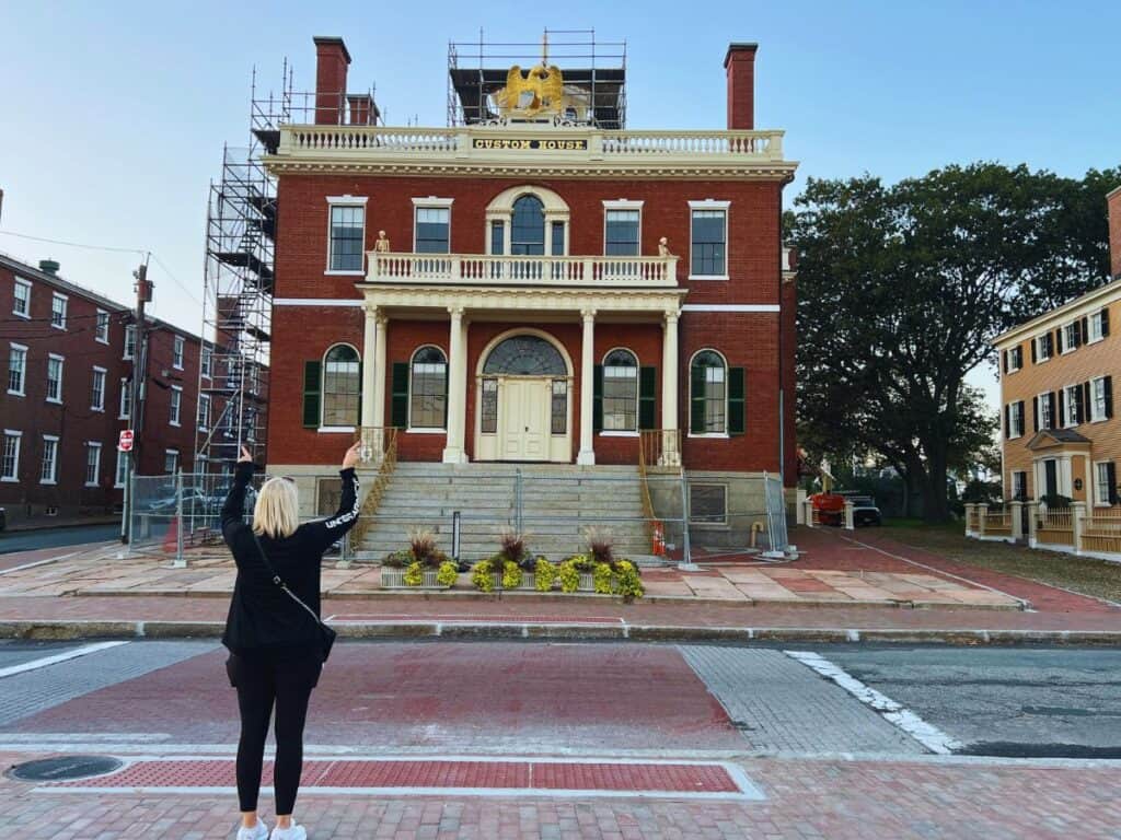 A woman is surprised to learn that the Custom House in Salem, MA is undergoing renovations.