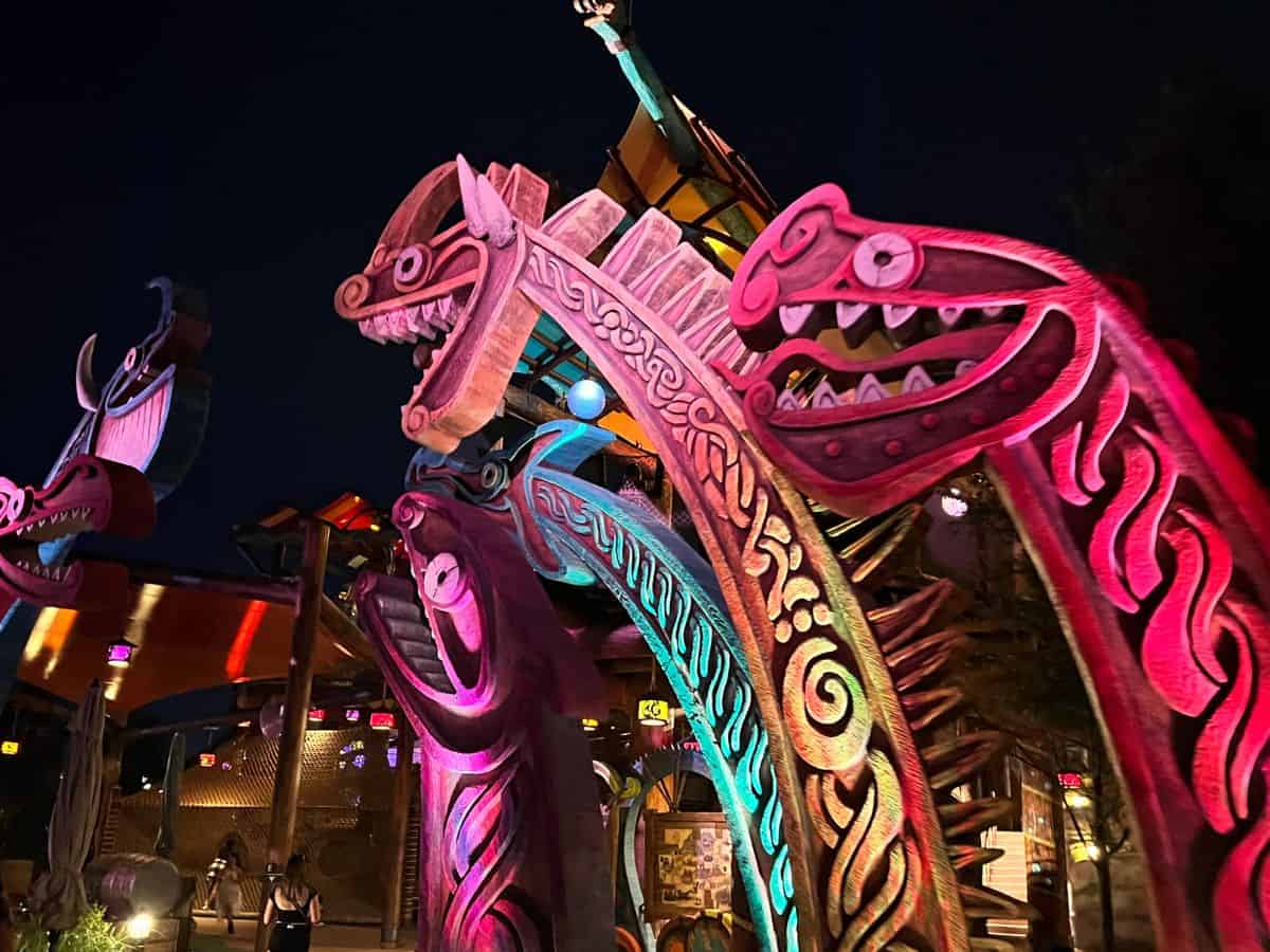 Isle of Berk dragon figures take on a colorful glow at night