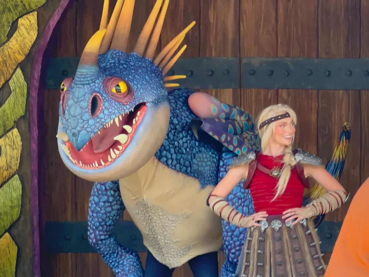 Stormfly and Astrid happily greet guests at Isle of Berk in Epic Universe.