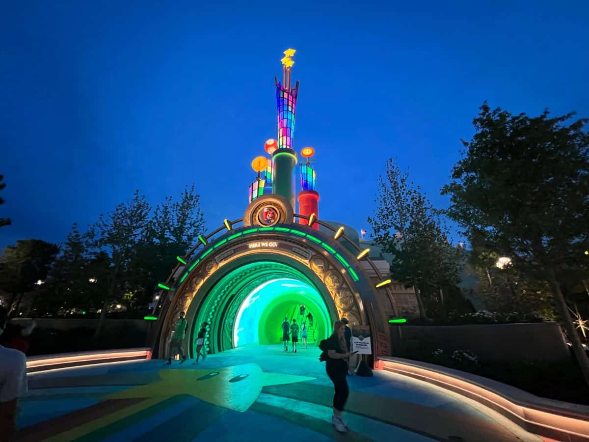 The Super Nintendo World portal in Epic Universe features Mario, stars, coins, and Toad