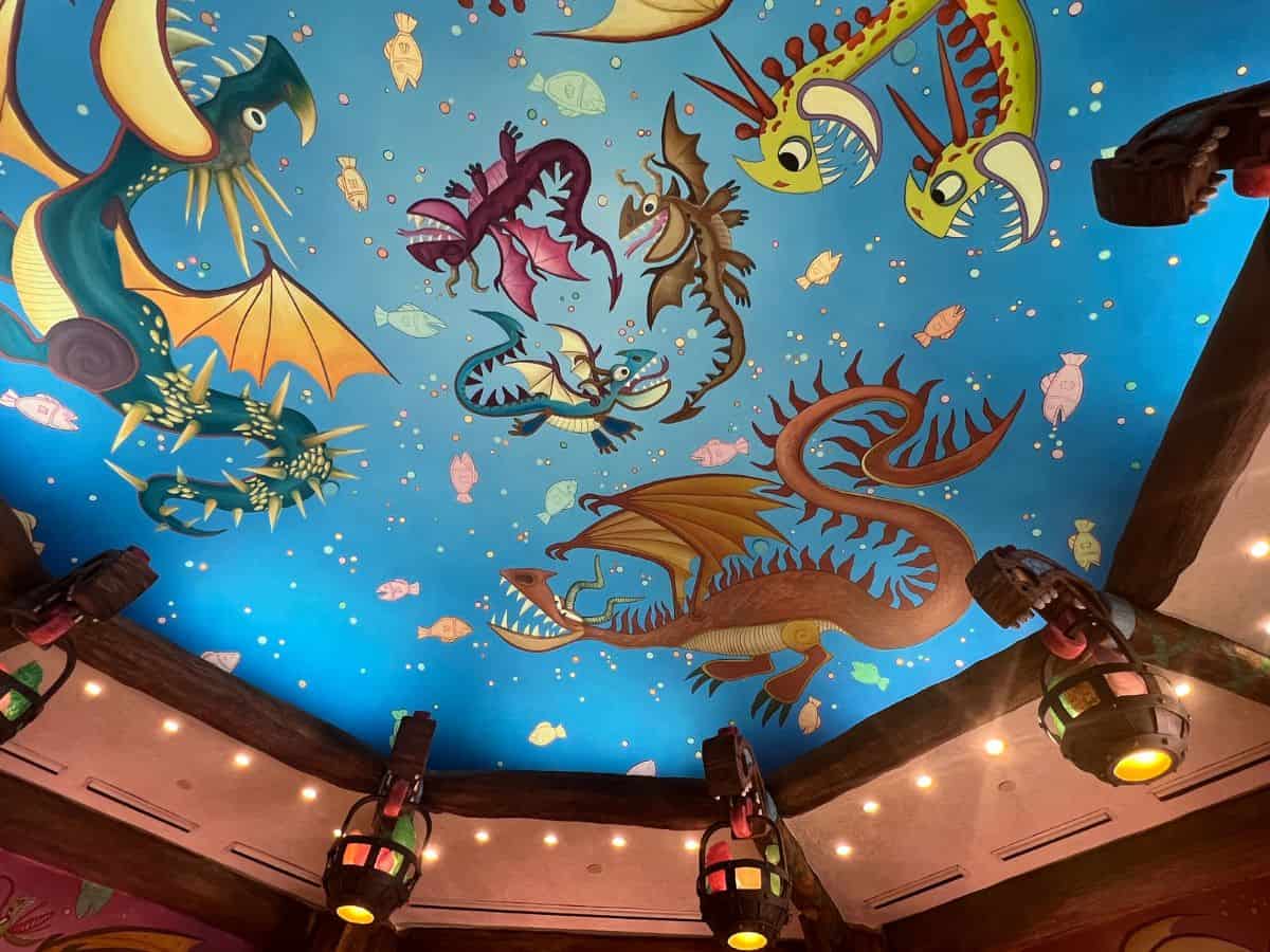 A ceiling is painted with colorful dragons