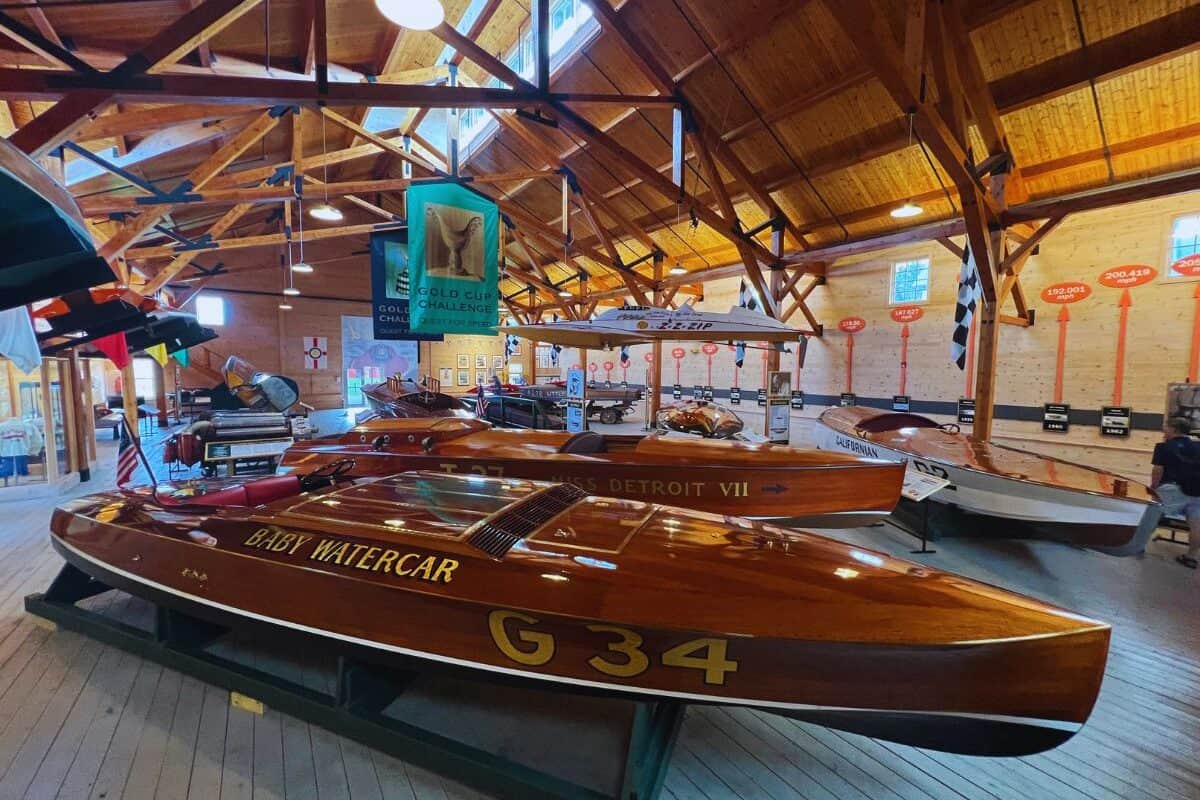 Antique wooden boats line a room at the Antique Boat Museum in Clayton, New York