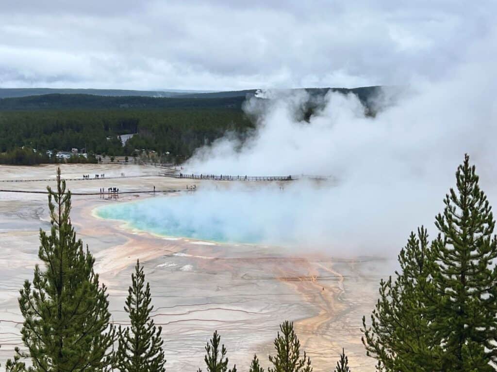 Steam rises from Grand Prismatic Spring in Yellowstone National Park, Wyoming